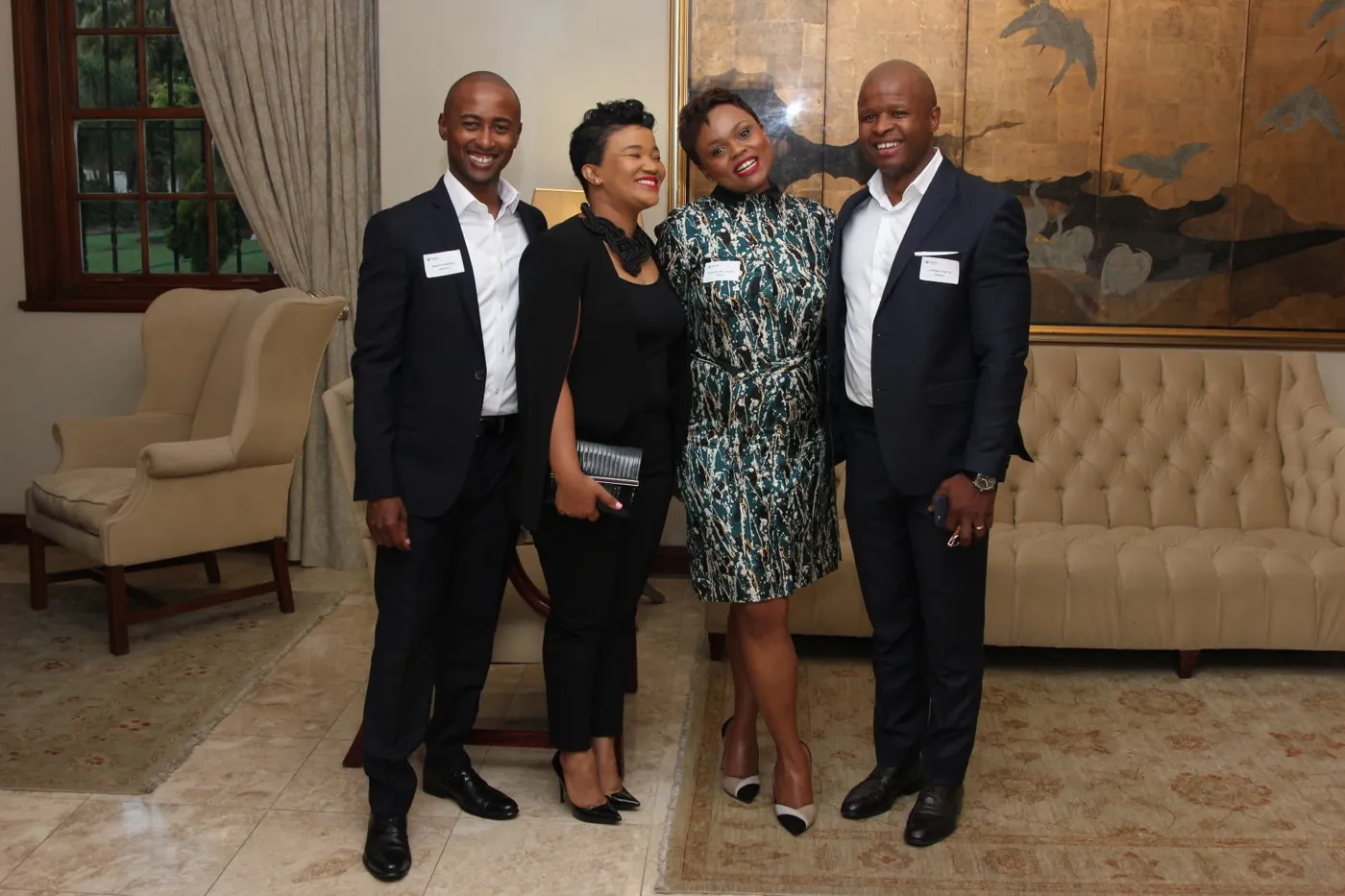 Lubabalo Dyantyi and Baxolile Mabinya with guests at the Deviare launch