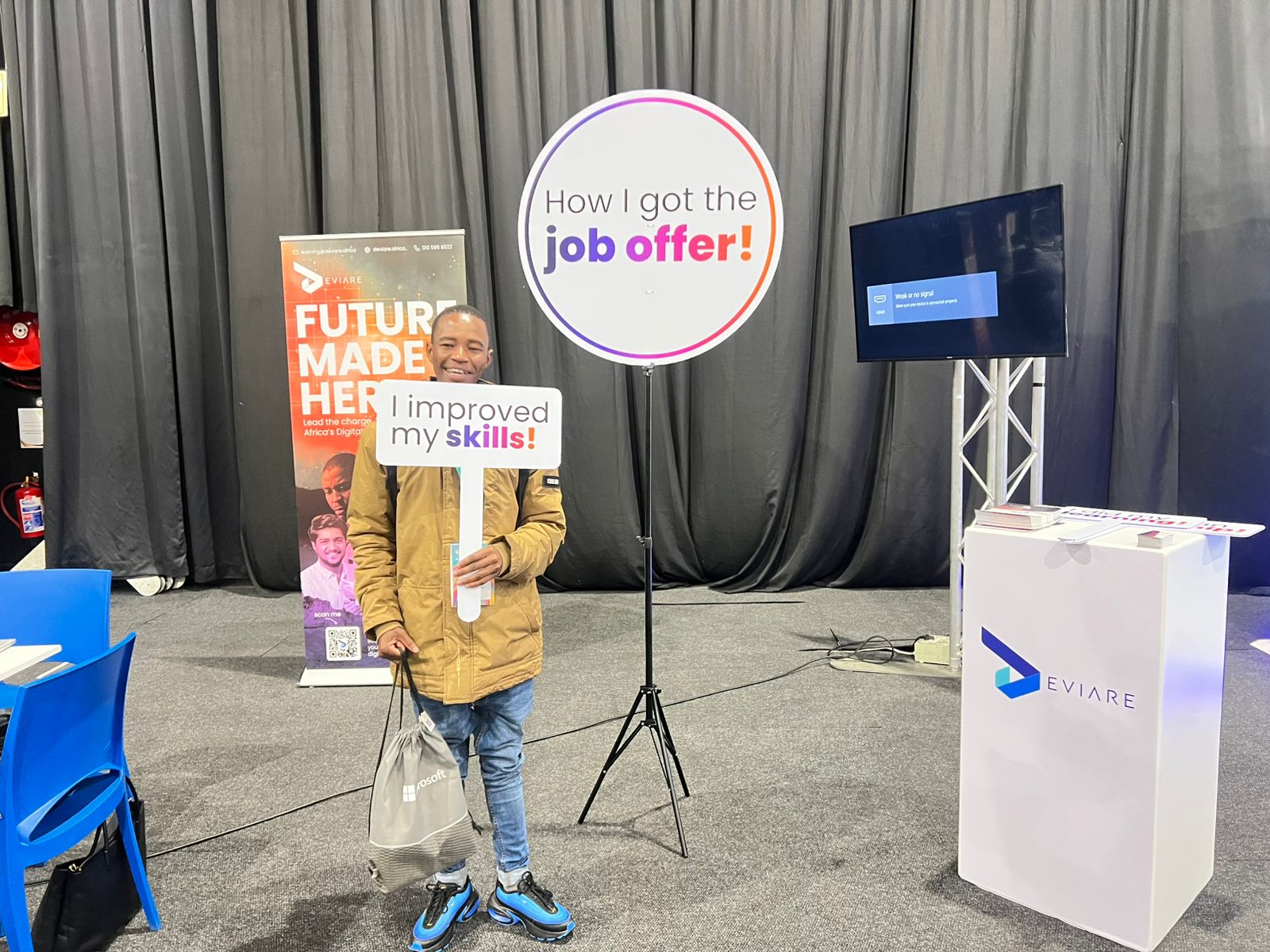 Deviare learner celebrating a new job offer at the Future Made Here campus activation